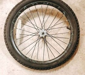 She cuts the rubber off a bike tire to get this breathtaking mantel idea