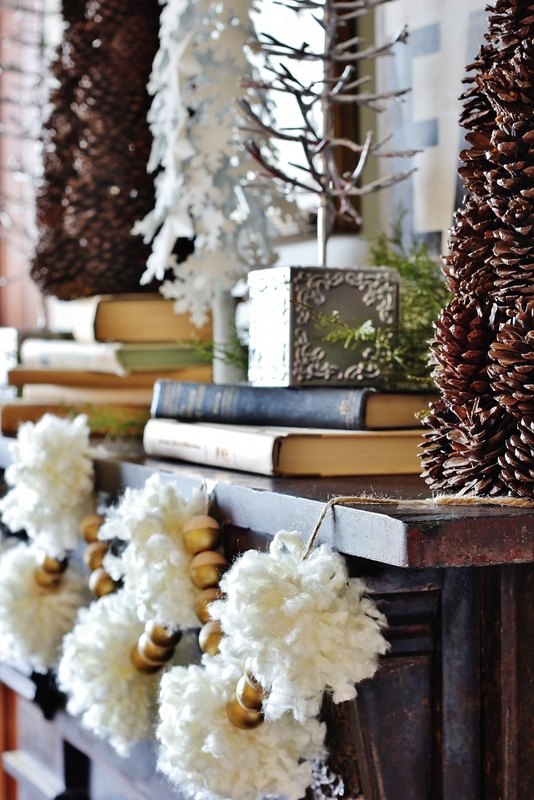beat the january blues with these 15 lovely winter decor ideas, Pom Pom and Bead Garland