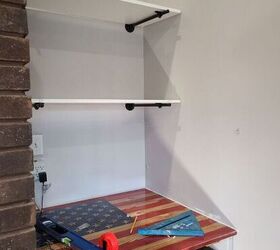 building a floating desk, Shelves installed with industrial pipe