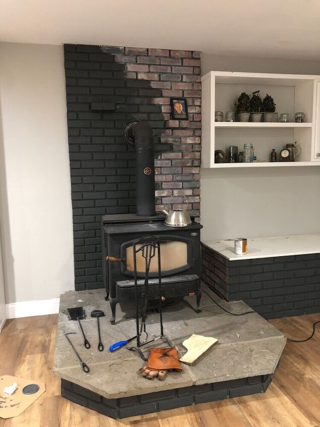 painted brick wood stove fireplace