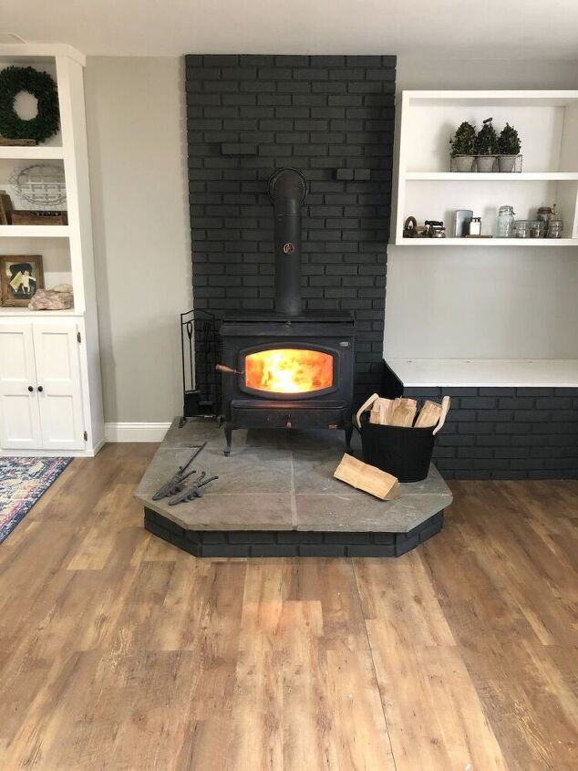 painted brick wood stove fireplace