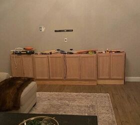 our diy built in media center reveal material list cost included, Cabinets secured to wall and platform base