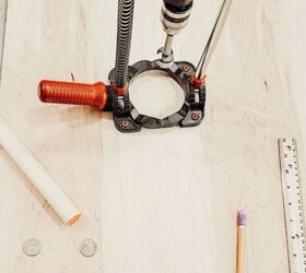 Hang a piece of plywood above your desk to add style & organization