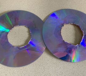 How she makes seriously trendy lighting using 2 old CD's