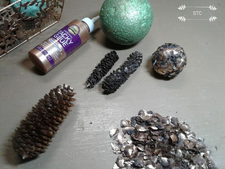 creating decor orbs from styrofoam balls, Snipping the Pine Cone