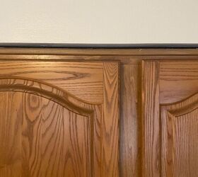 How to fix gap between kitchen cabinets and soffit?
