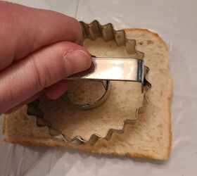 She cuts shapes out of bread slices for this cute garden idea