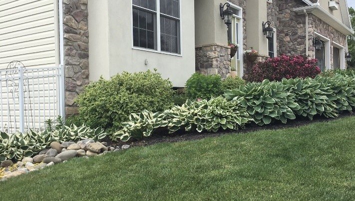 s top 14 curb appeal ideas to save for spring, Stone Garden Wall DIY