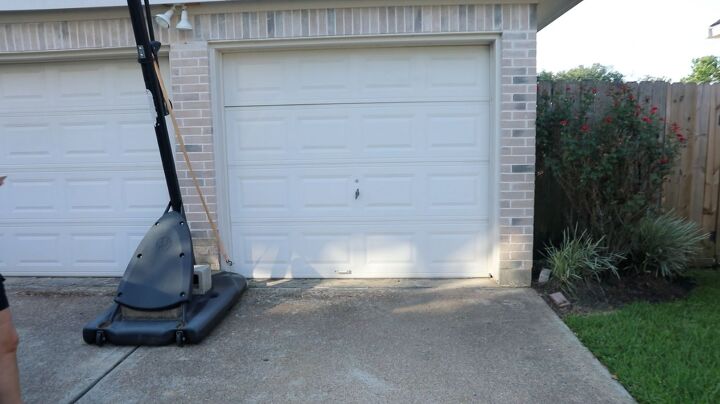 s top 14 curb appeal ideas to save for spring, Creating a Faux Wood Garage Door