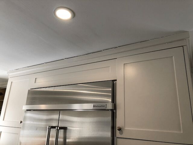how to fix those ugly gaps in your crown molding and kitchen cabinets