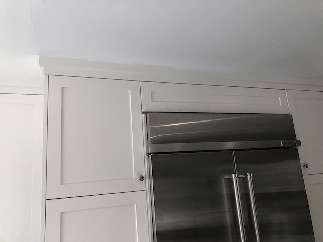 how to fix those ugly gaps in your crown molding and kitchen cabinets