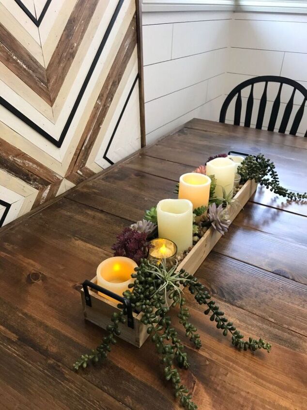centro de mesa con velas y suculentas