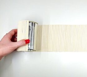 Wrap a bamboo mat around a can for this quick $5 storage idea