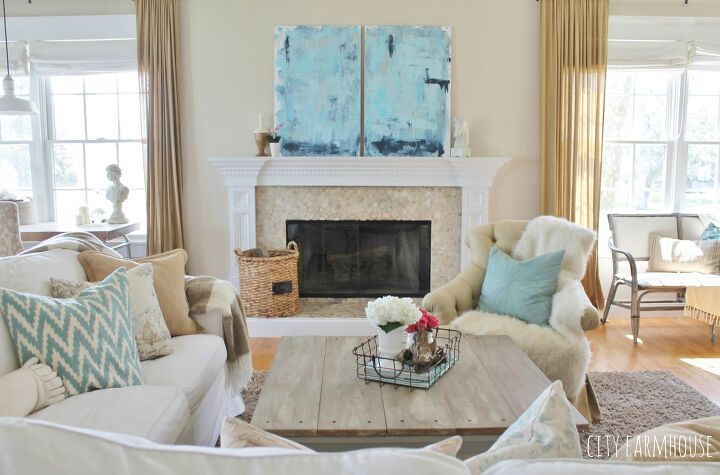 20 ways to add a coastal vibe to your home without being tacky, Display paintings with ocean blues