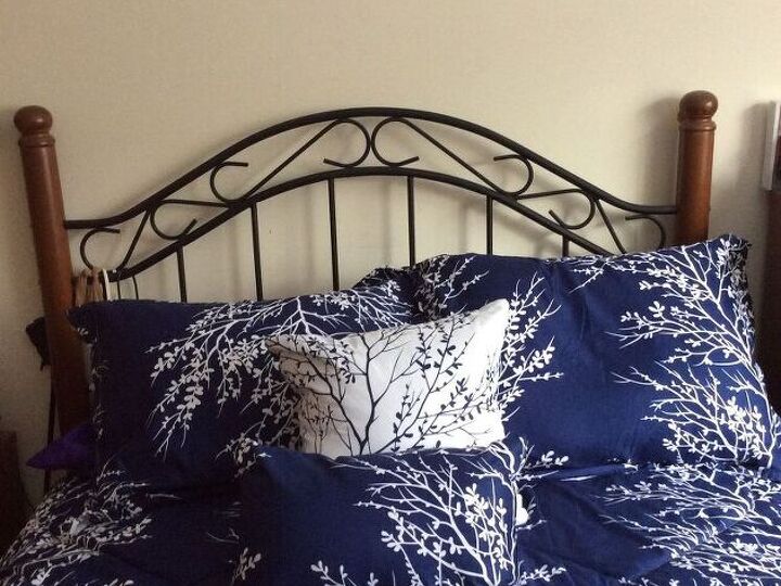 q how to decorate wall behind bed
