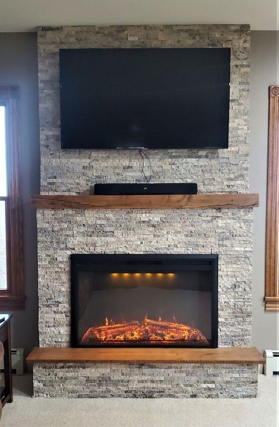 how to build a diy stone fireplace, From a blank wall to a beautiful focal point