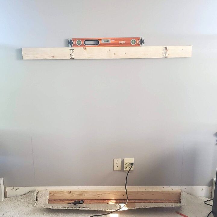 how to build a diy stone fireplace, We had mounted our first 2x4s to the wall