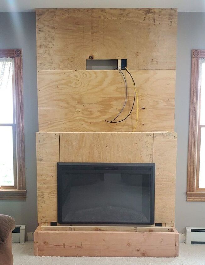 how to build a diy stone fireplace, Plywood Wrapped Fireplace