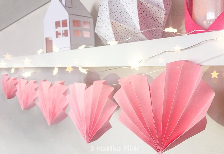 guirnalda de corazones rosa con papel