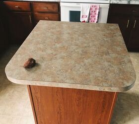 Tired of her dingy kitchen countertops, she cleaned them for this incredible $200 flip