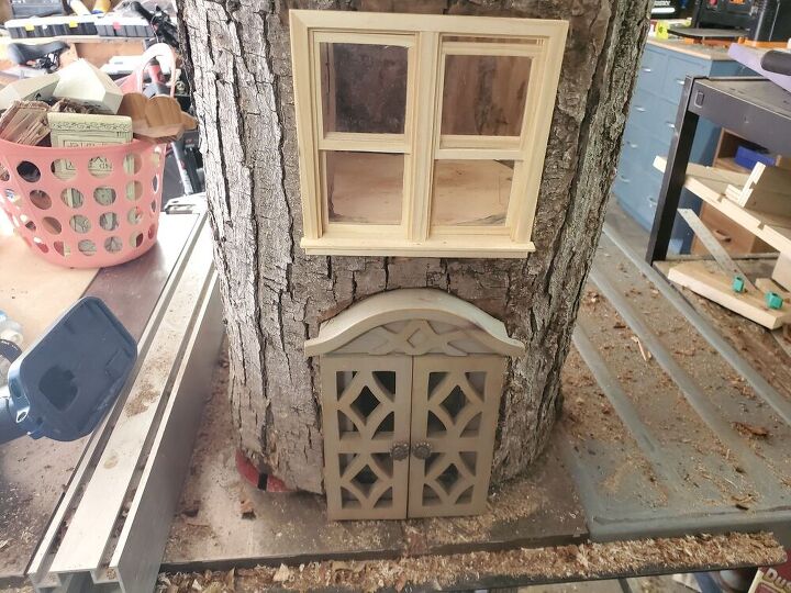 how to make a diy log fairy house that looks like magic, Paint windows and doors to match