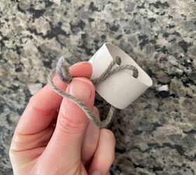 She cuts up an empty toilet paper roll to make these for her countertop (in 10 minutes!)