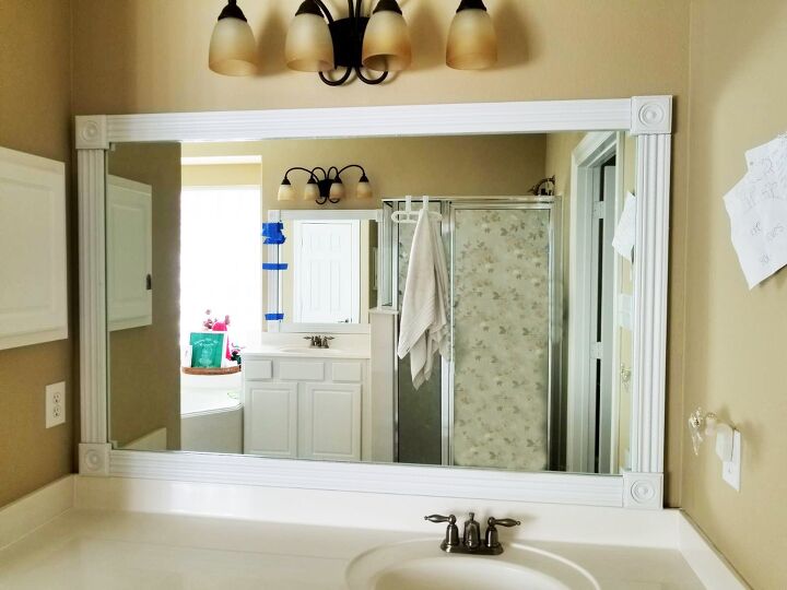 20 bathroom updates that ll make you smile while you brush your teeth, Make your existing mirror look more polished with an added frame
