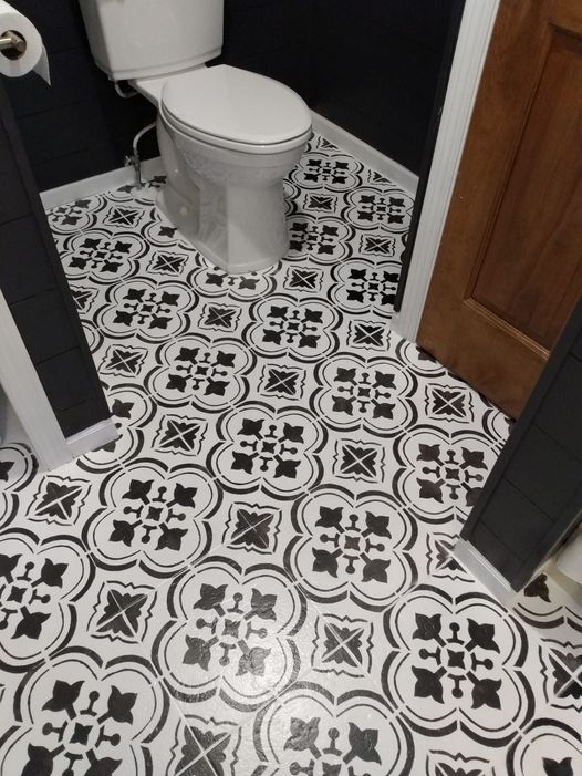 20 bathroom updates that ll make you smile while you brush your teeth, Stencil your tile floor for an updated look
