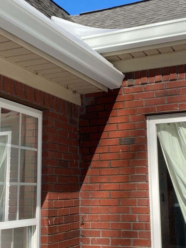 q how to avoid water being trapped at the corner of my house