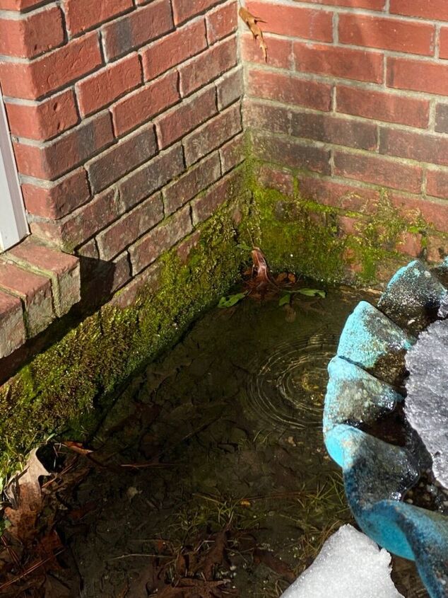 q how to avoid water being trapped at the corner of my house