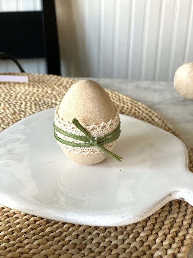 s 20 creative easter ideas you ll need this spring, Wooden egg table decoration