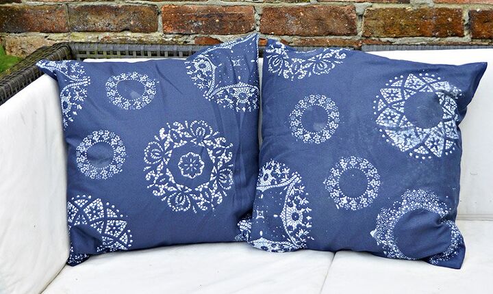 s 13 cool pillow ideas that ll make it feel like you bought a new couch, Revamp old cushion covers with paper doily stencils
