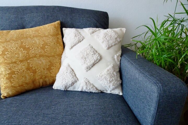s 13 cool pillow ideas that ll make it feel like you bought a new couch, Get a cozy tufted effect with sherpa fabric