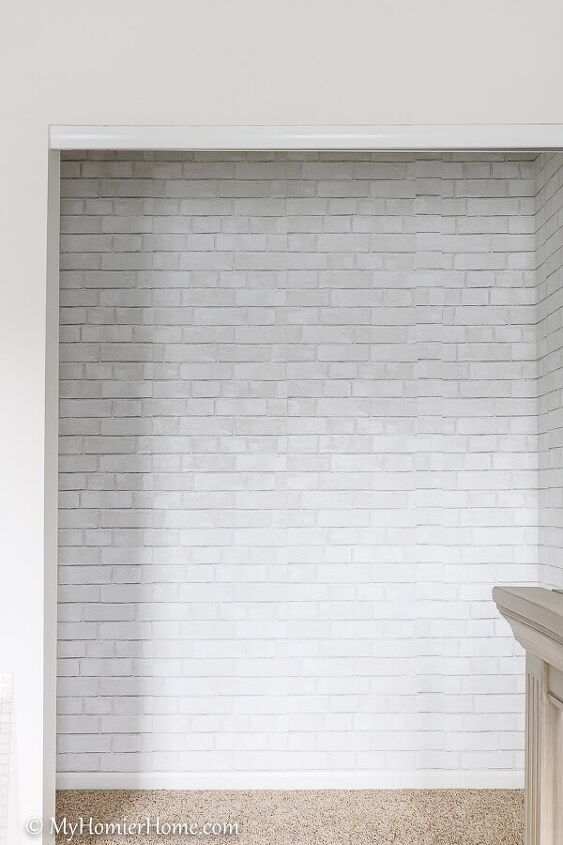 s 16 crazy cool ways people are upgrading their closet space, This white brick wallpapered wall