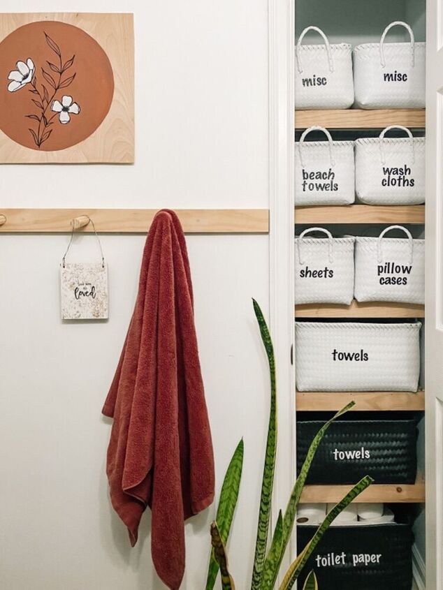 s 16 crazy cool ways people are upgrading their closet space, Her labeled linen closet bins
