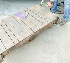 how to restore an old railroad cart into a coffee table, Here you can see where we had to hammer down some nails