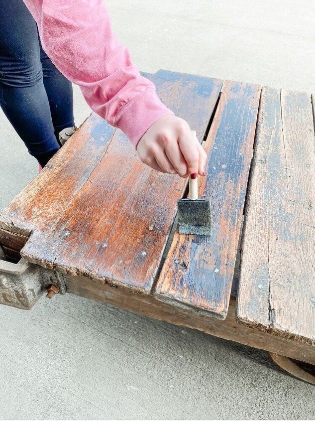 how to restore an old railroad cart into a coffee table, This sealer really brought out the black color even more