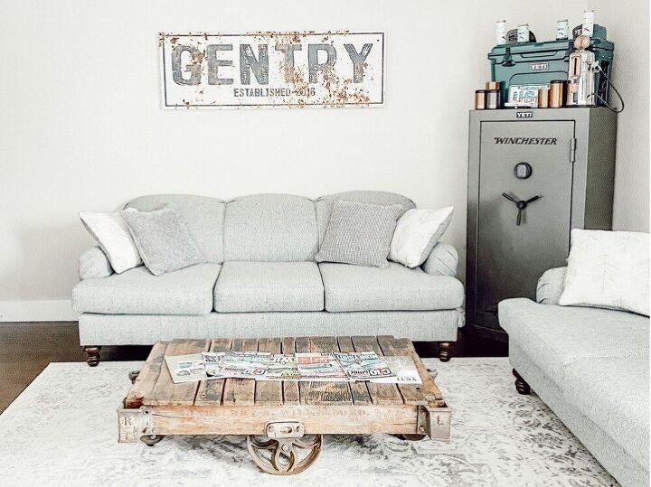 how to restore an old railroad cart into a coffee table, I also moved our living room rug down here to this space and I think it fits much better down here instead I will link it below