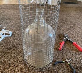 Wrap chicken wire around a jug to copy this stunning countertop idea