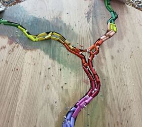 He stuffs broken crayons into a crack in his table for this striking idea