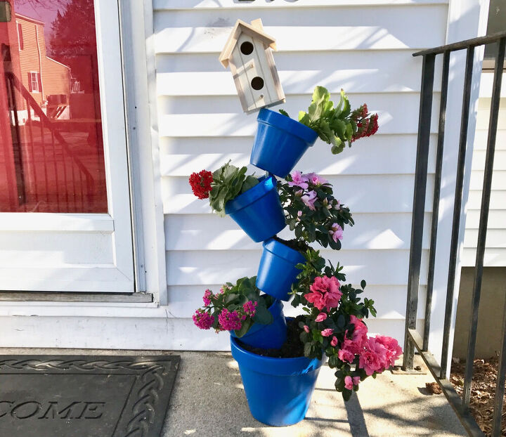 25 spring porch ideas that ll brighten up your block, Bright blue topsy turvy planter