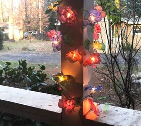 25 spring porch ideas that ll brighten up your block, Fun plastic flower string lights