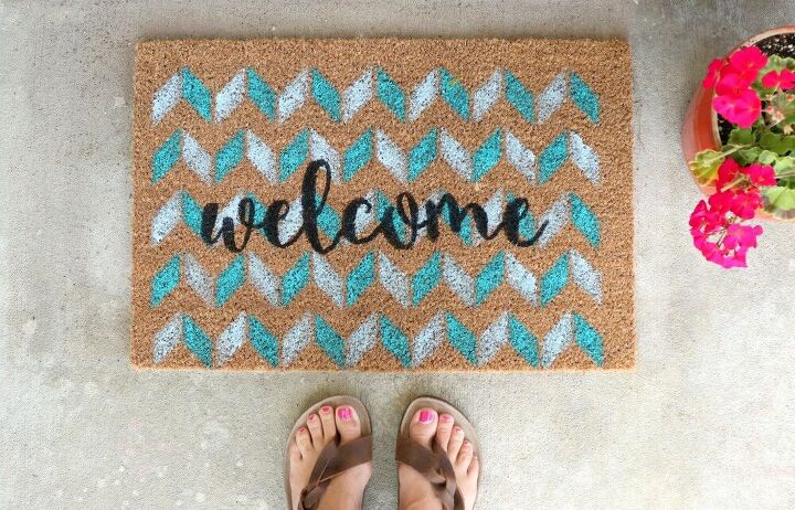 25 spring porch ideas that ll brighten up your block, Stenciled patterned welcome mat