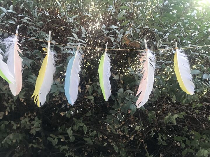 25 spring porch ideas that ll brighten up your block, Sparkling springtime feather garland