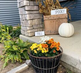 25 spring porch ideas that ll brighten up your block, Rustic wire basket flower pot