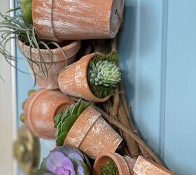 s 17 awesome dollar store pot ideas everyone will be copying this spring, Clay Pot Wreath