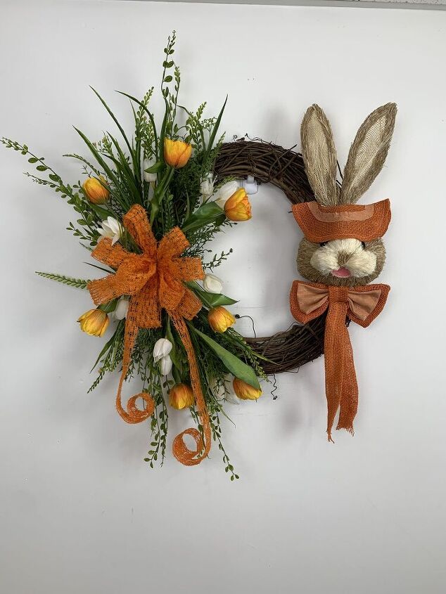 14 maneras ms lindas de decorar tu espacio para la pascua, Guirnalda de conejos con orejas plegables