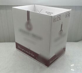 After blowing her makeover budget, she uses wine boxes to get designer, $2 storage