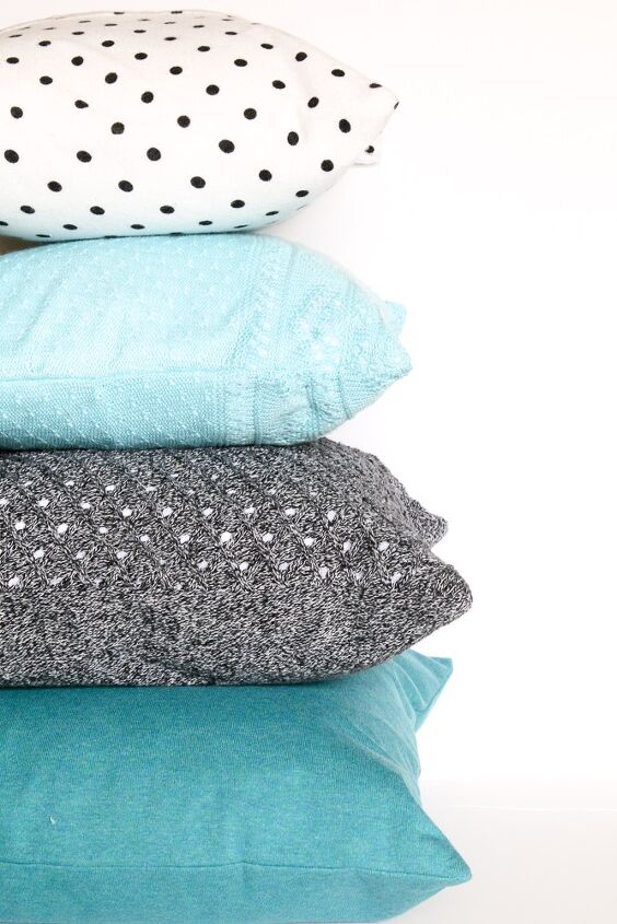s 15 ways to make your bed look super comfy, Turn sweaters into cozy pillows
