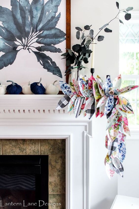 s 15 stunning ways to spruce up your mantel this month, Use scrapbook paper for a paper leaf garland